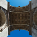 Looking up at the Arc de Triomphe