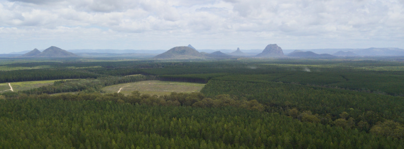 View of the Glasshouse Mountains from above 27 Degrees South, 153 Degrees East